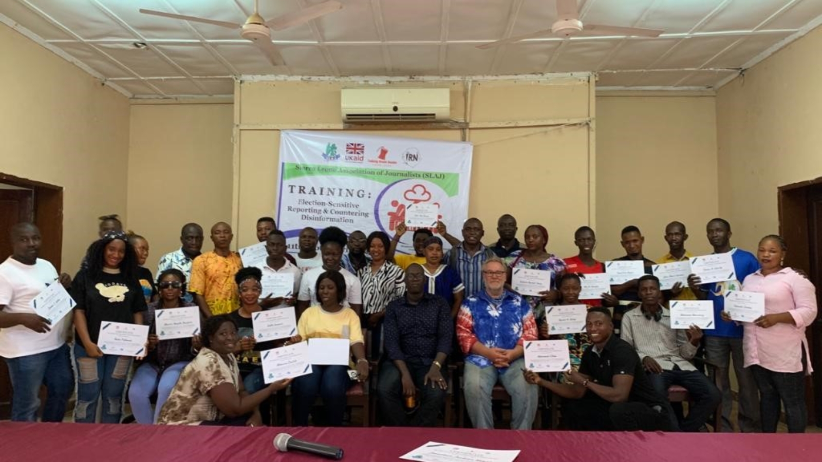 Cross section of participants from Bombail, Port Loko, Kono, Falaba and Tonkolili districts with their certificates of participation